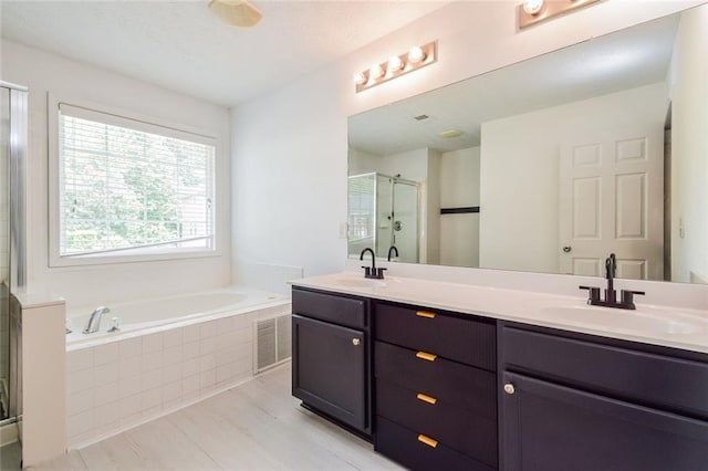 5900 Fairington Farms Ln, Stonecrest, GA 30038 - full bath featuring a stall shower, double vanity, and a bath