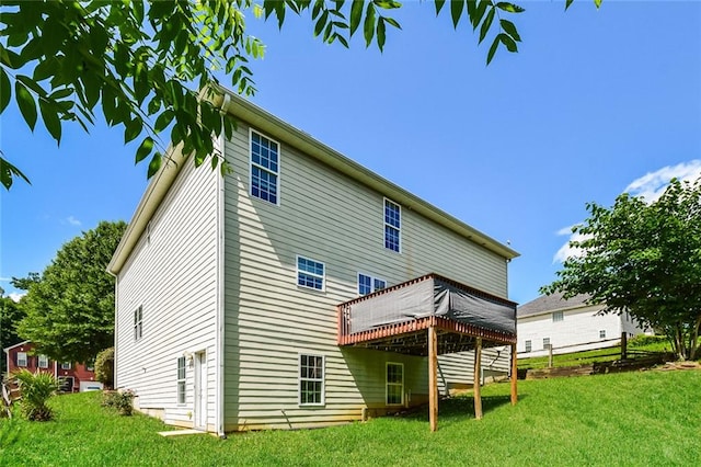 5900 Fairington Farms Ln, Stonecrest, GA 30038 - rear view of house featuring a deck and a yard