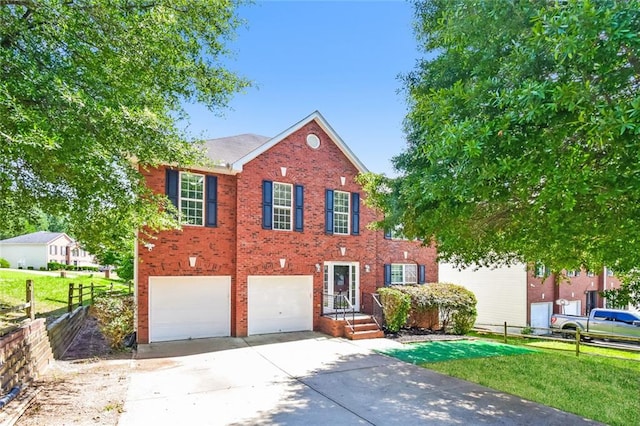 5900 Fairington Farms Ln, Stonecrest, GA 30038 - view of front of house with an attached garage, concrete driveway, and brick siding