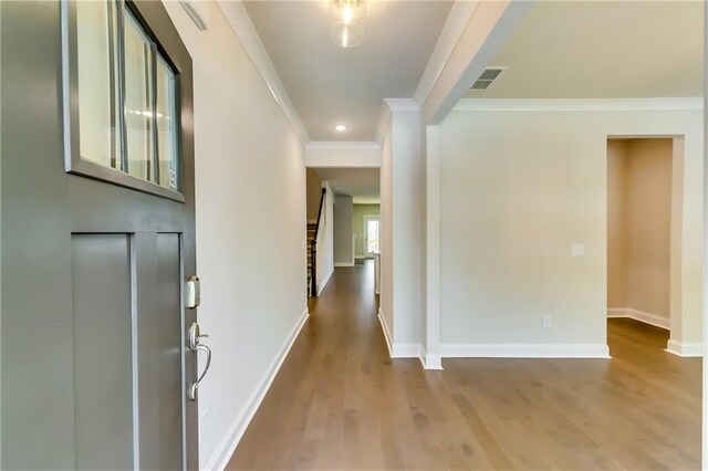 321 Principal Meridian Dr, Dallas, GA 30132 - unfurnished dining area with wood finished floors, a notable chandelier, a wainscoted wall, and a decorative wall
