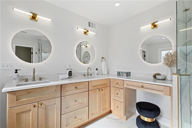 bathroom with marble finish floor, a sink, visible vents, and a shower with door