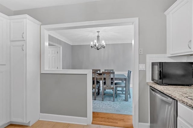4 Mount Vernon Cir, Atlanta, GA 30338 - dining room featuring a chandelier, baseboards, and crown molding