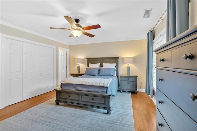 4 Mount Vernon Cir, Atlanta, GA 30338 - bedroom featuring light wood finished floors, ornamental molding, a closet, and a ceiling fan