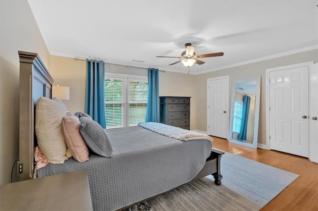 4 Mount Vernon Cir, Atlanta, GA 30338 - bedroom featuring crown molding, wood finished floors, and a ceiling fan