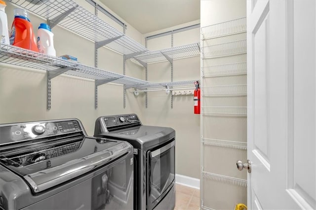 4 Mount Vernon Cir, Atlanta, GA 30338 - washroom with washer and clothes dryer, baseboards, and light tile patterned floors
