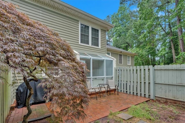 4 Mount Vernon Cir, Atlanta, GA 30338 - back of property featuring a fenced backyard, a patio, and a sunroom