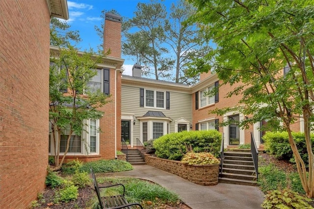 4 Mount Vernon Cir, Atlanta, GA 30338 - back of property with a chimney and brick siding