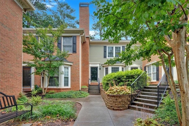 4 Mount Vernon Cir, Atlanta, GA 30338 - view of front of property featuring a chimney and brick siding