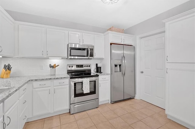 4 Mount Vernon Cir, Atlanta, GA 30338 - kitchen featuring appliances with stainless steel finishes, white cabinetry, and backsplash