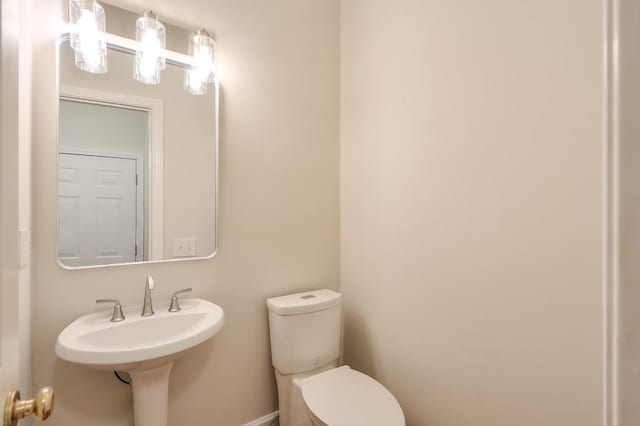 bathroom featuring toilet