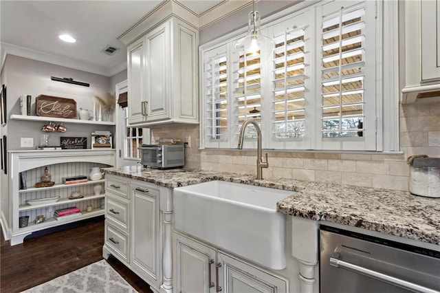 kitchen featuring stainless steel dishwasher, decorative backsplash, sink, hanging light fixtures, and dark hardwood / wood-style flooring