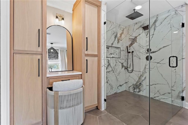 bathroom with a shower with shower door