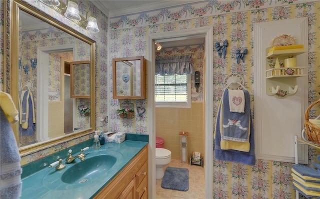 bathroom featuring tile patterned floors, wallpapered walls, toilet, and vanity