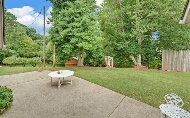 view of patio / terrace featuring fence