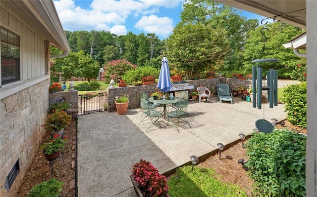 view of patio with outdoor dining space