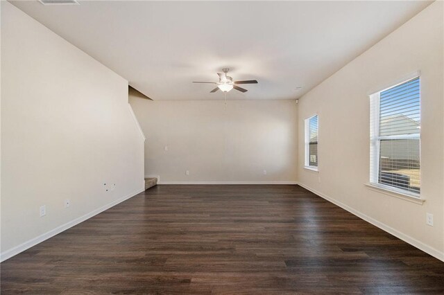 empty room featuring dark wood-type flooring