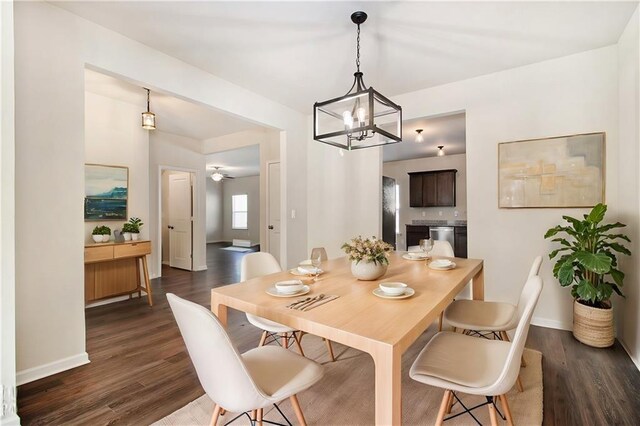 kitchen featuring stainless steel appliances, dark hardwood / wood-style flooring, and dark brown cabinetry