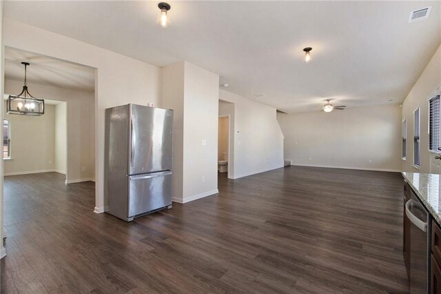 spare room with light colored carpet and ceiling fan