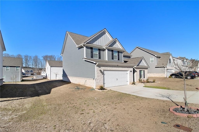 view of front of property featuring a front yard and a garage