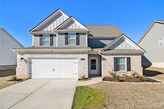 craftsman-style home featuring a garage and a front lawn