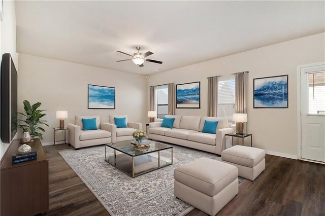 spare room featuring ceiling fan and dark wood-type flooring