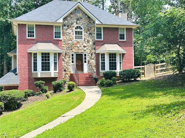 3460 Ebenezer Rd, Marietta, GA 30066 - view of front of property featuring a chimney, stone siding, and brick siding