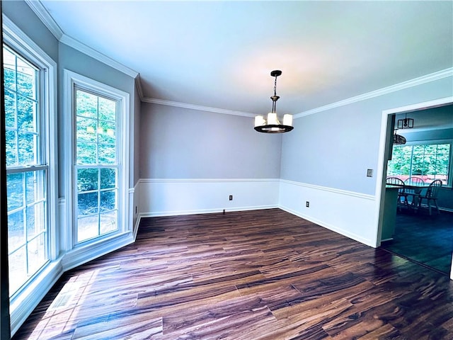 3460 Ebenezer Rd, Marietta, GA 30066 - unfurnished room featuring a chandelier, plenty of natural light, dark wood finished floors, and crown molding