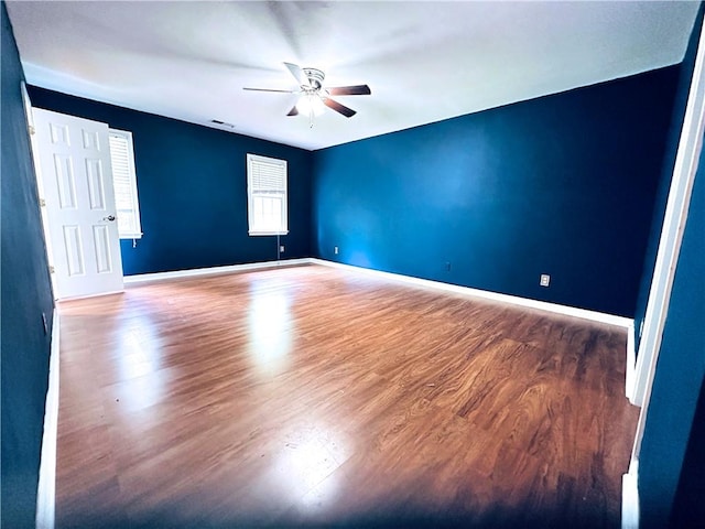 3460 Ebenezer Rd, Marietta, GA 30066 - spare room featuring ceiling fan and wood finished floors
