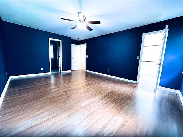 3460 Ebenezer Rd, Marietta, GA 30066 - empty room with wood finished floors and ceiling fan