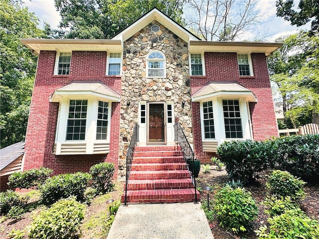 3460 Ebenezer Rd, Marietta, GA 30066 - view of front of property featuring stone siding, brick siding, and entry steps