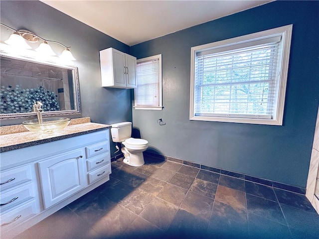 3460 Ebenezer Rd, Marietta, GA 30066 - full bathroom featuring vanity, a shower, and stone finish flooring