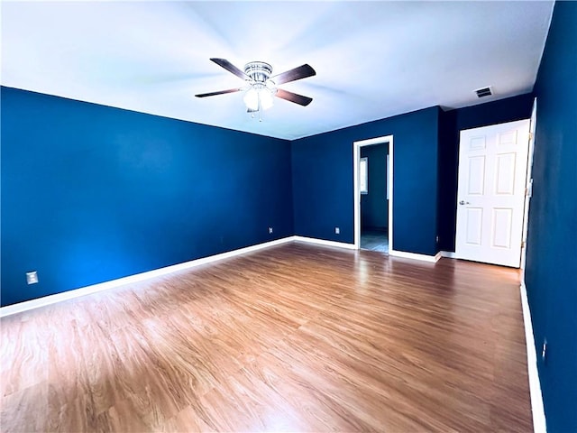 3460 Ebenezer Rd, Marietta, GA 30066 - unfurnished room featuring a ceiling fan and wood finished floors