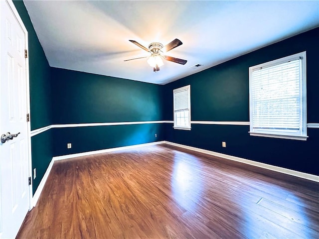 3460 Ebenezer Rd, Marietta, GA 30066 - empty room featuring ceiling fan and wood finished floors