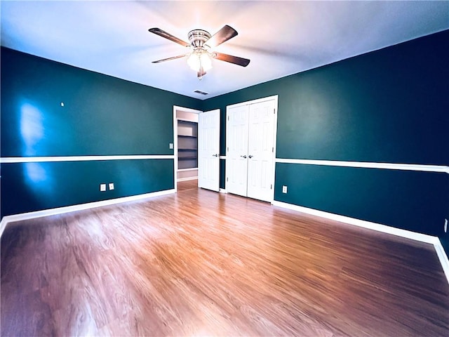 3460 Ebenezer Rd, Marietta, GA 30066 - unfurnished room featuring a ceiling fan and wood finished floors