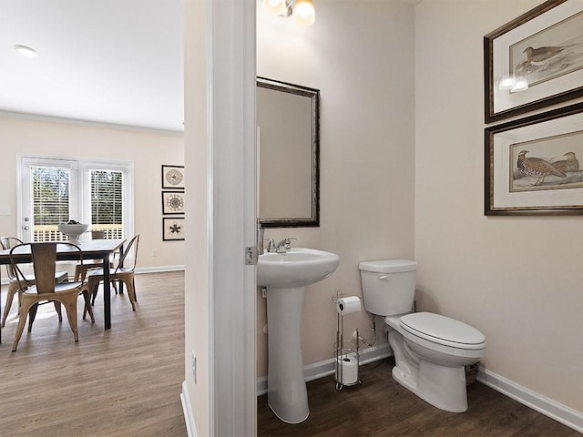 366 Lost Creek Blvd, Dallas, GA 30132 - bathroom with baseboards, toilet, wood finished floors, and a sink