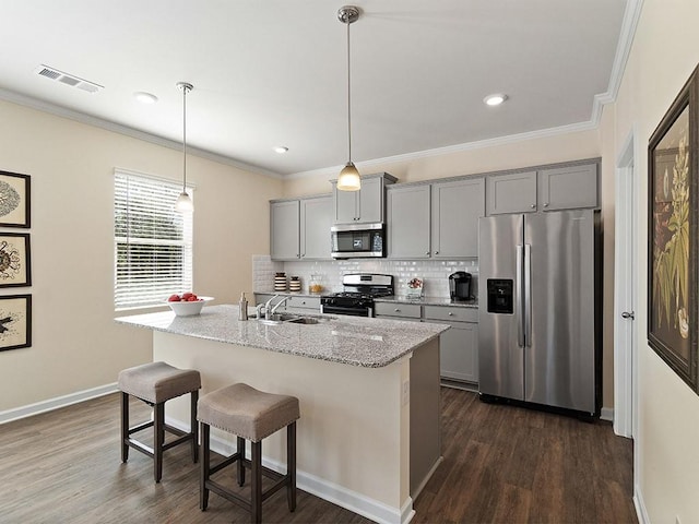 366 Lost Creek Blvd, Dallas, GA 30132 - kitchen featuring appliances with stainless steel finishes, gray cabinets, a sink, crown molding, and dark wood-style flooring
