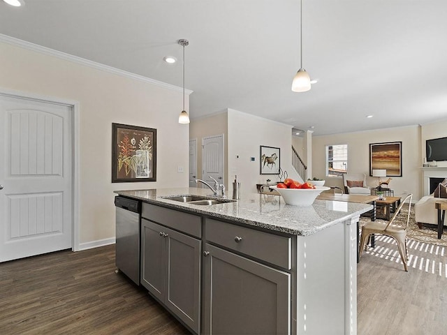 366 Lost Creek Blvd, Dallas, GA 30132 - kitchen with stainless steel dishwasher, a sink, gray cabinets, dark wood finished floors, and ornamental molding
