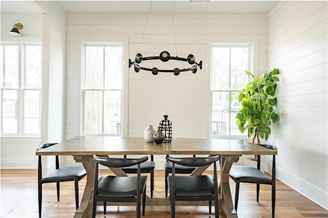 dining area featuring wood-type flooring