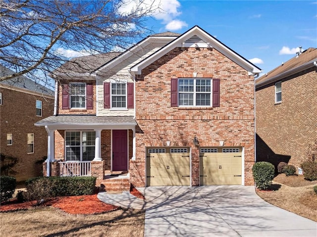 craftsman-style house with a porch, concrete driveway, brick siding, and an attached garage