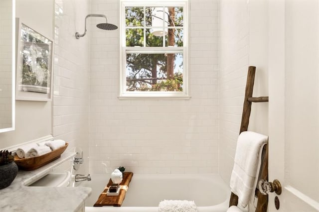 bathroom with vanity and shower / washtub combination