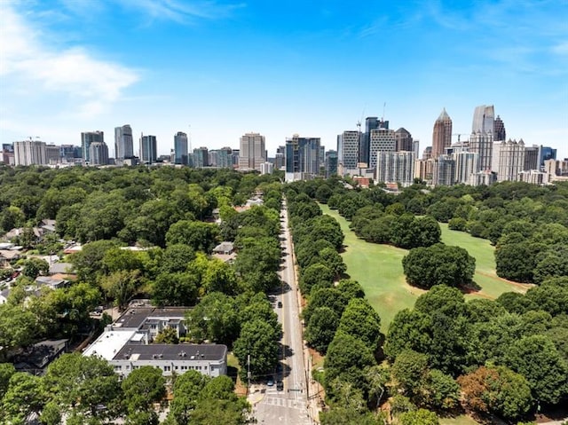 birds eye view of property featuring a city view