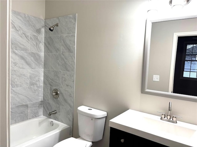 full bath with toilet,  shower combination, and vanity