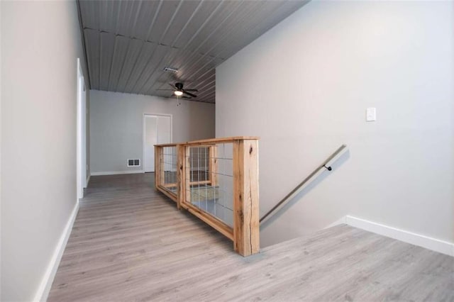 2125 Mccollum Church Rd, Lineville, AL 36266 - stairway with baseboards, wood finished floors, and ceiling fan