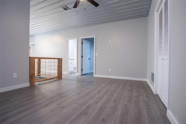 2125 Mccollum Church Rd, Lineville, AL 36266 - spare room featuring a ceiling fan, wood finished floors, and baseboards