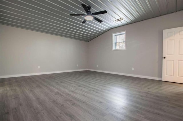 2125 Mccollum Church Rd, Lineville, AL 36266 - empty room with lofted ceiling, wood finished floors, baseboards, and a ceiling fan