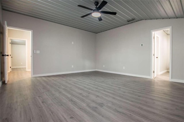 2125 Mccollum Church Rd, Lineville, AL 36266 - unfurnished room with wood finished floors, ceiling fan, baseboards, vaulted ceiling, and wood ceiling