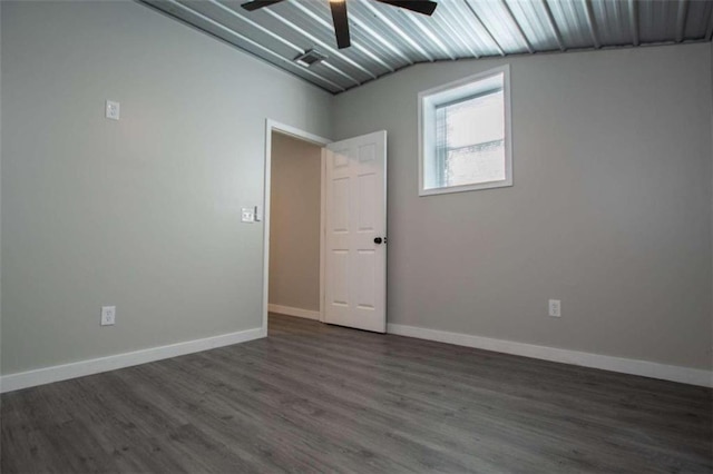 2125 Mccollum Church Rd, Lineville, AL 36266 - unfurnished room featuring ceiling fan, dark wood-style floors, baseboards, and lofted ceiling
