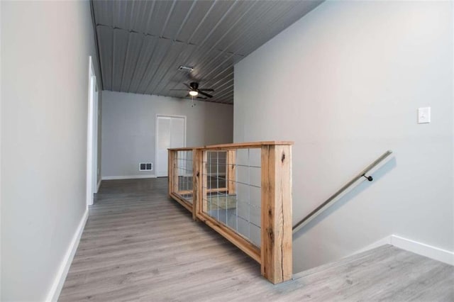 2125 Mccollum Church Rd, Lineville, AL 36266 - hallway with an upstairs landing, baseboards, and wood finished floors