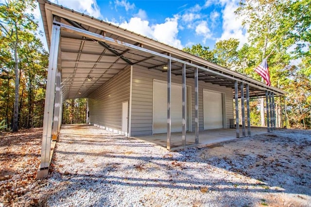 2125 Mccollum Church Rd, Lineville, AL 36266 - view of vehicle parking featuring a detached garage