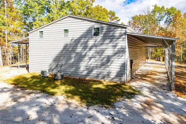 2125 Mccollum Church Rd, Lineville, AL 36266 - view of side of home with an attached carport